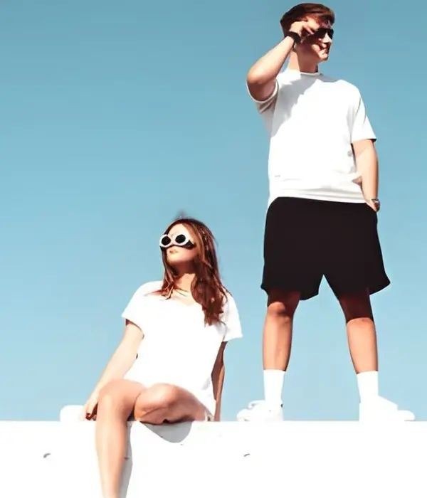 Man and Women Wearing Custom Sports Clothes
