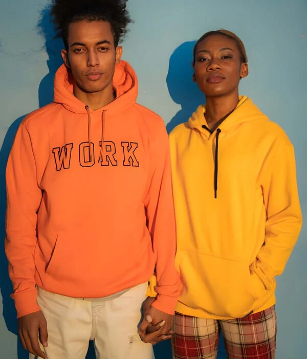 couple wearing hoodies of different colors