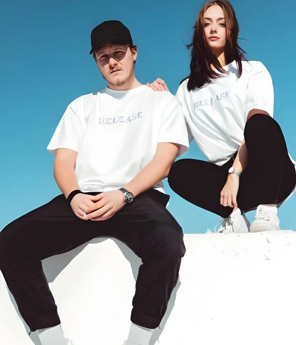 couple wearing white t shirt made by humex apparel