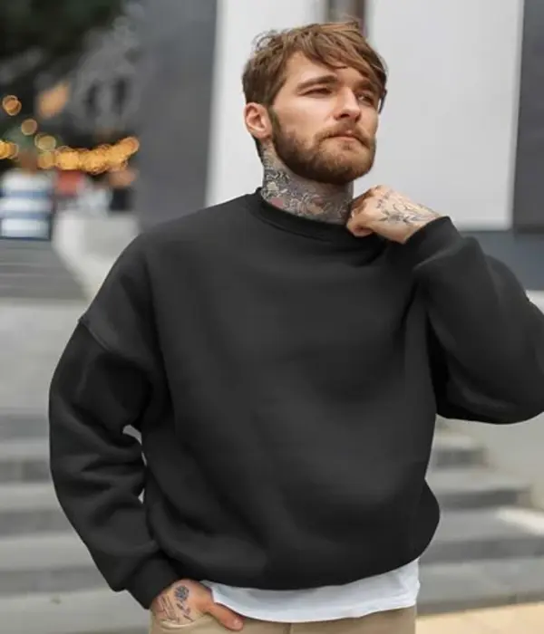 male wearing black sweatshirt
