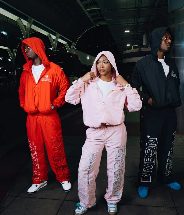 people wearing different colours of tracksuits