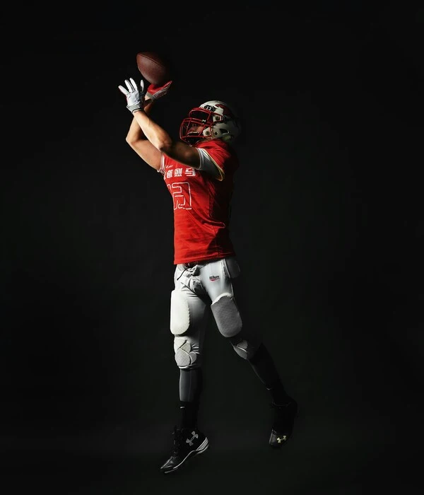 red and white american football uniform